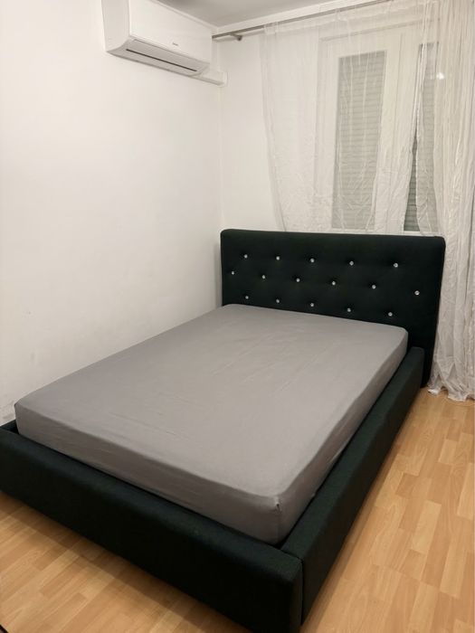 Łózko glamour butelkowa zielen tapicerowane