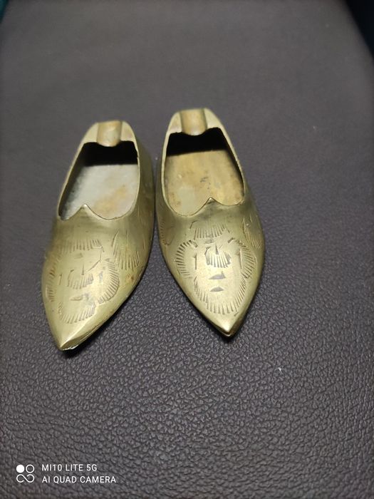 Sapatinhos de latão cinzeiro