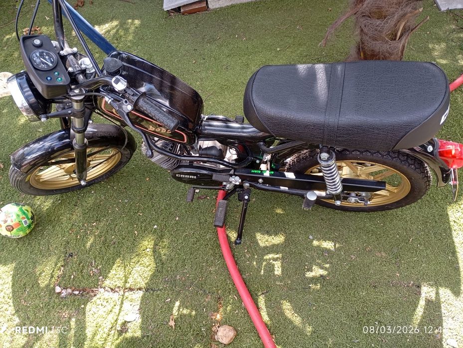 Motorizada casal boss e Sachs V5