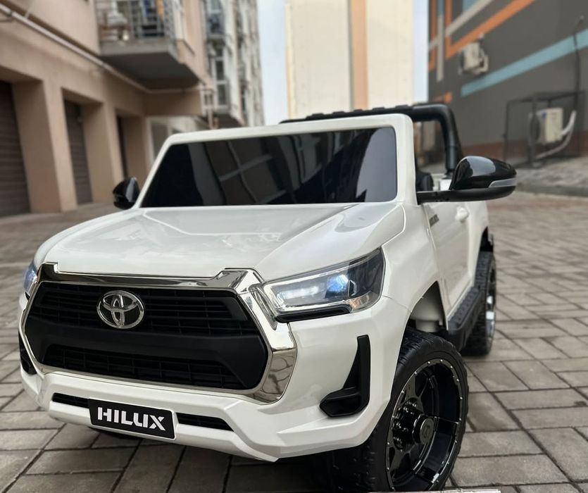 Детский электромобиль Toyota Hilux Двухместный дитячий електромобіль
