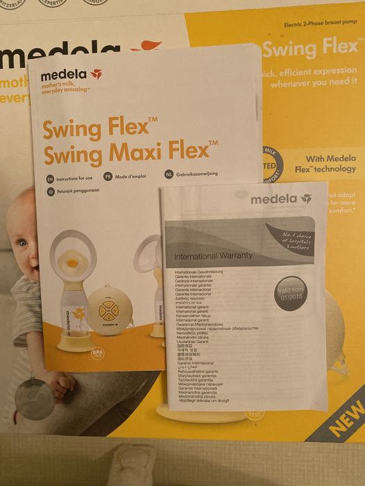 Електронный молокоотсос medela