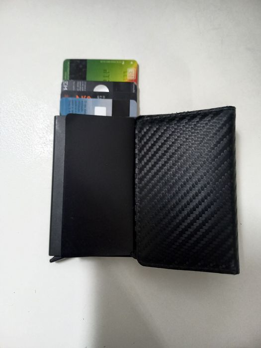 Carteira de homem preta usada em muito bom estado