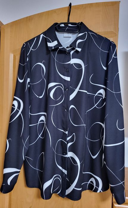 Nowa elegancka koszula z długim rękawem