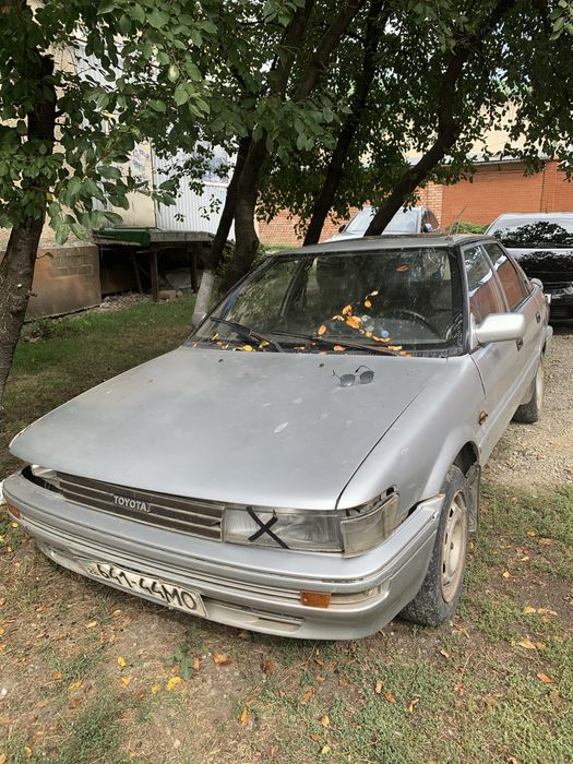 Тойота Королла е90