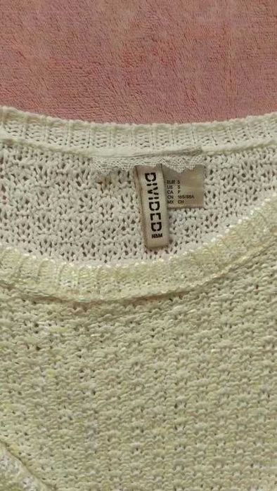 Cytrynowy połyskujący sweterek z falbanką H&M r. S