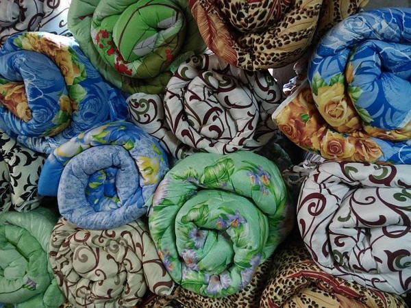 Стирка и химчистка одеял и пледов.
