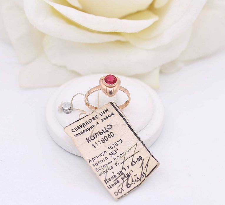 Złoty pierścionek p.585/1,77g z różowym kamieniem