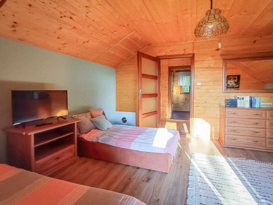 Domki letniskowe z kominkiem, jacuzzi i sauną.