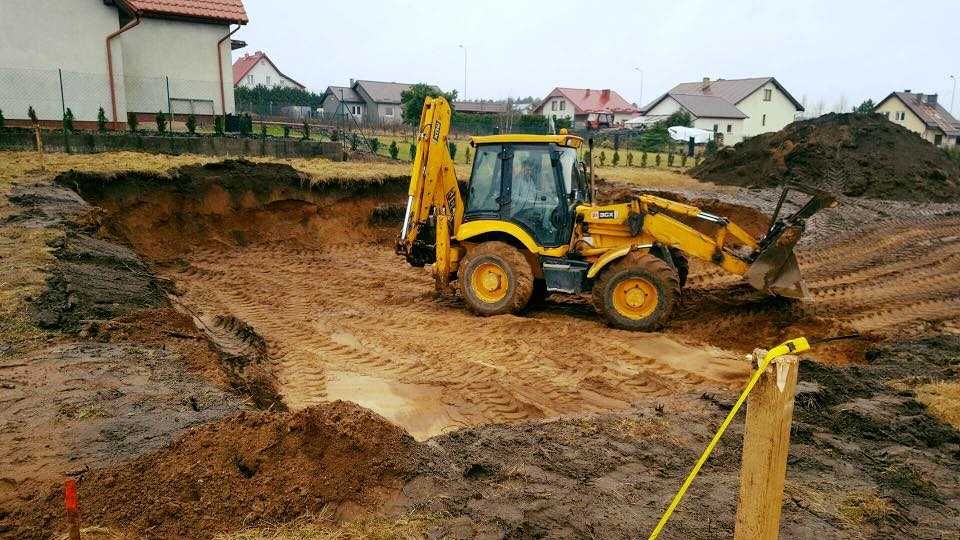 roboty ziemne koparki JCB kruszywo rozbiórka wykopy transport