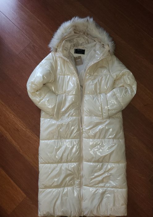 Продам новый  пуховик