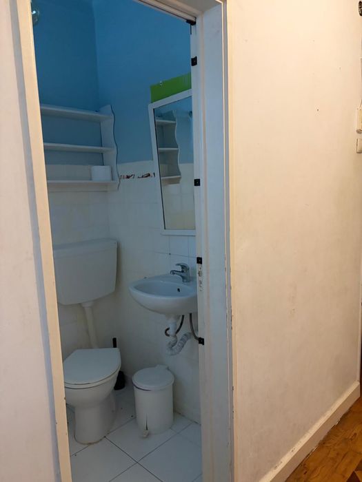 Quarto com casa de banho