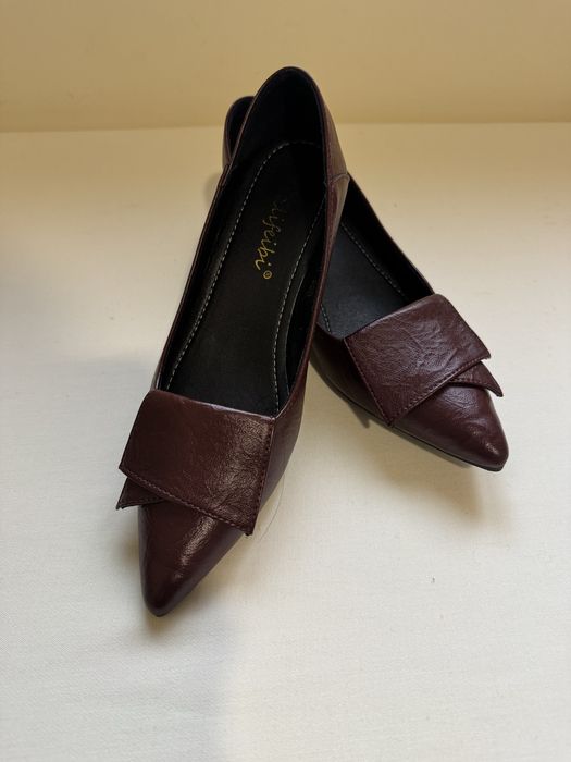 Sapatos em pele