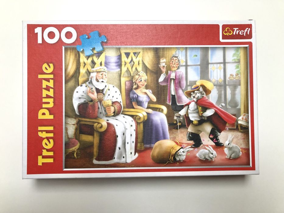 Puzzle trefl 100 elem. Kot w butach Śnieżka