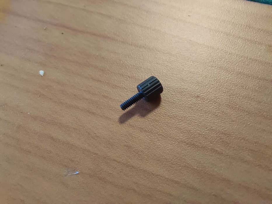 Parafuso de transporte para segurar agulha