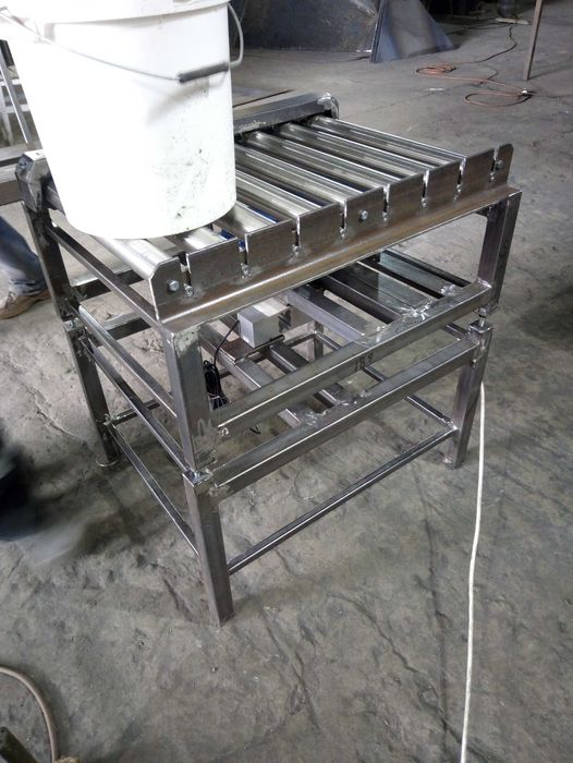 Транспортер роликовий, роликовий конвеєр, рольганг