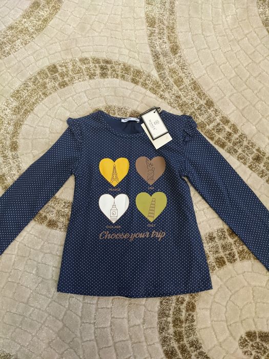 Нова кофточка на дівчинку