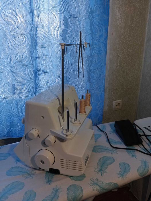 Оверлок Jaguar GT 970 новый