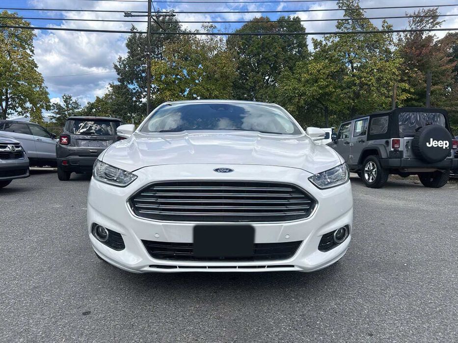Ford Fusion Titanium Hybrid      2014