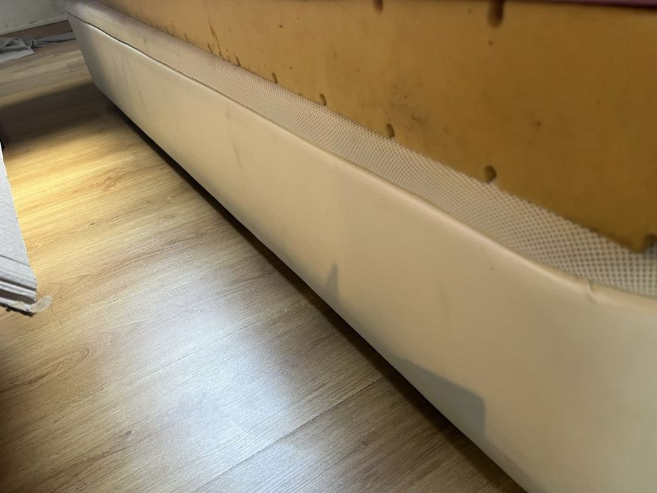 Cama individual com arrumação