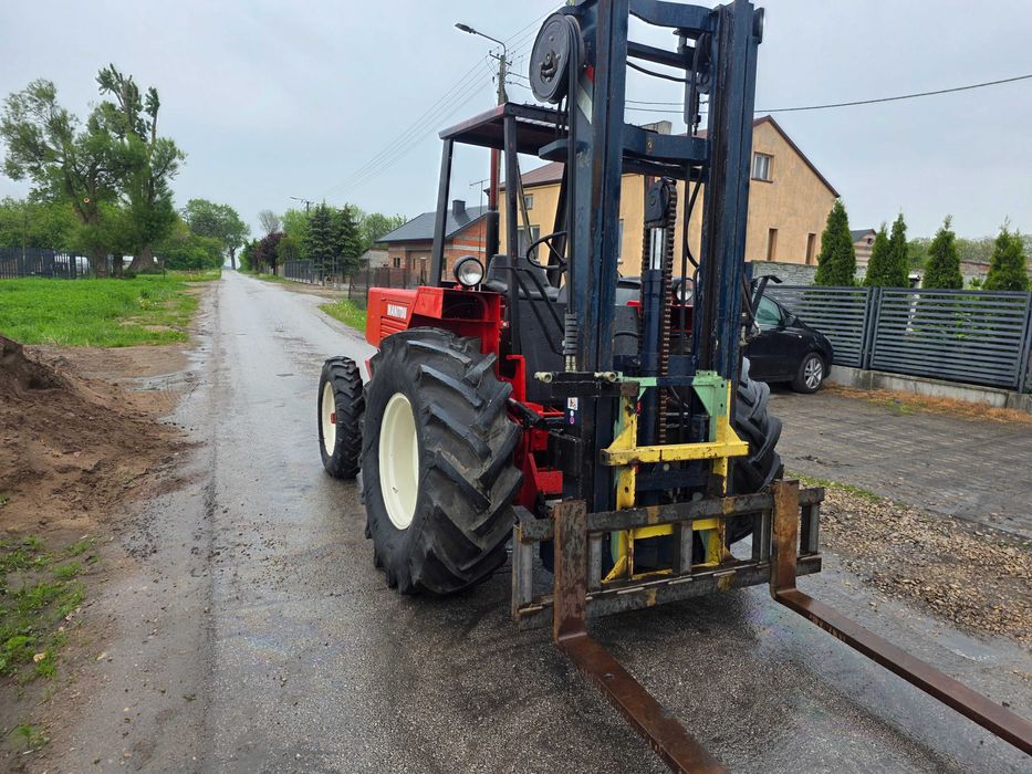 Terenowy wózek widłowy Manitou  wys. podnoszenia 580 cm