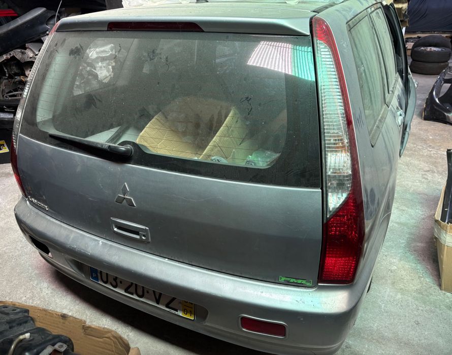 Guarda Lamas frente direito Mitsubishi Lancer SW, 2004