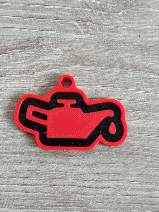 Stylowy Brelok Samochodowy niski poziom oleju dla Fana Motoryzacji