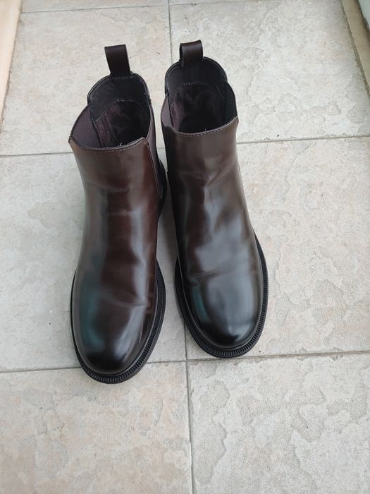 Par de Botas em Pele