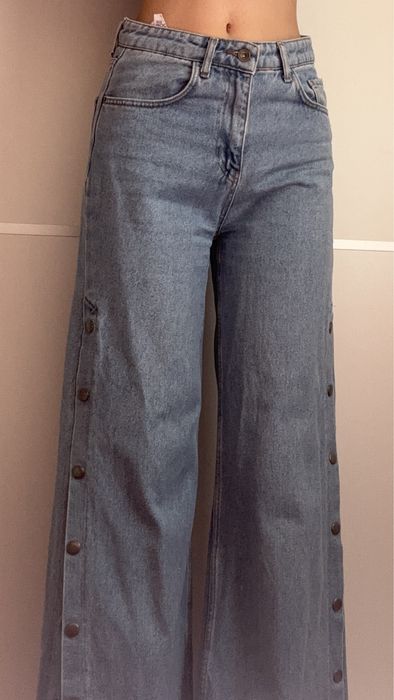 джинсы новые с лампасами