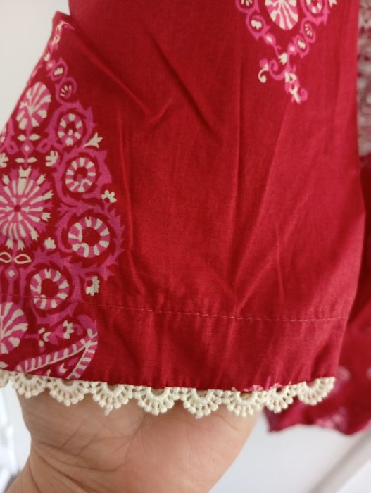 Tunica vermelho em medio