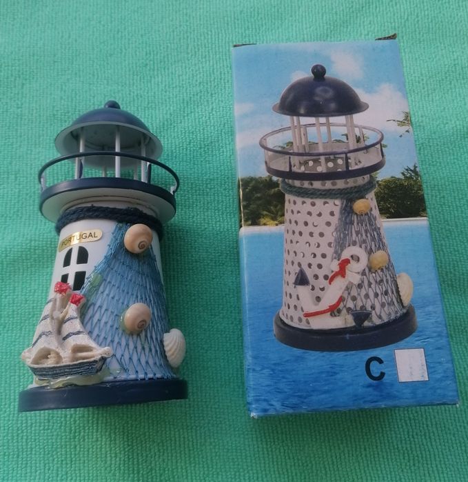 Peça para decoração são 2 faroisl