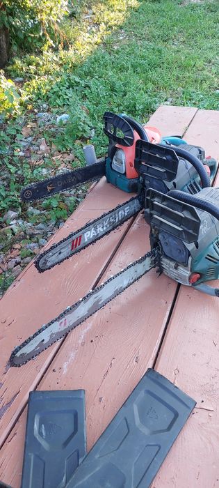 Бензинова ланцюгова пила Parkside 2 штуки та Makita