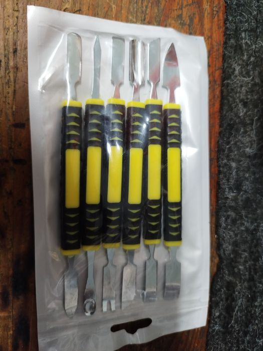Conjunto de espátulas para abertura electrónica