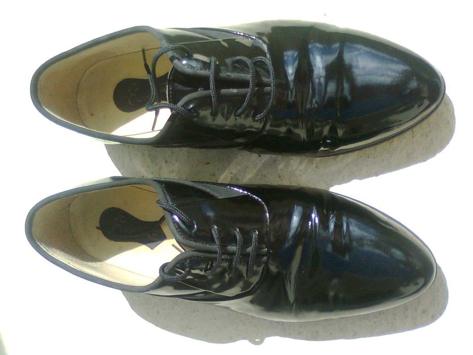 Sapatos como novos .