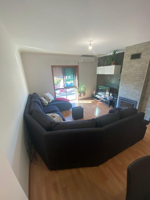 Sofá de canto com 3 pufs