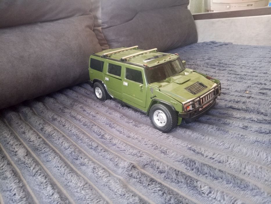 Іграшкова машинка-трансформер Hummer (джип зелений)