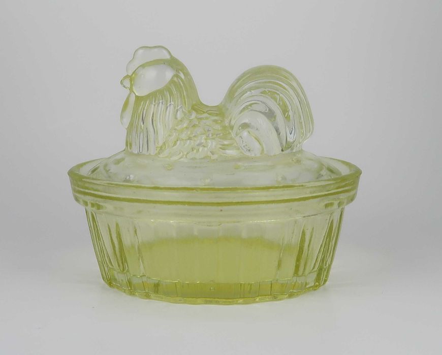 Manteigueira antiga em vidro amarelo