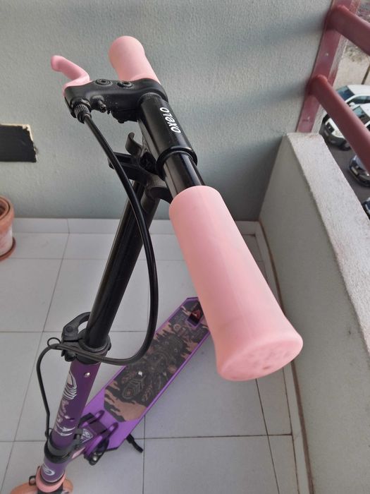 Trotinette  completamente nova,mto pouco uso