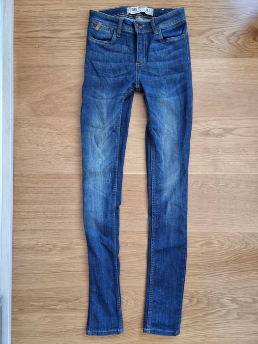 Spodnie jeansowe Diverse r.34. z przetarciami. nowe, bez metki