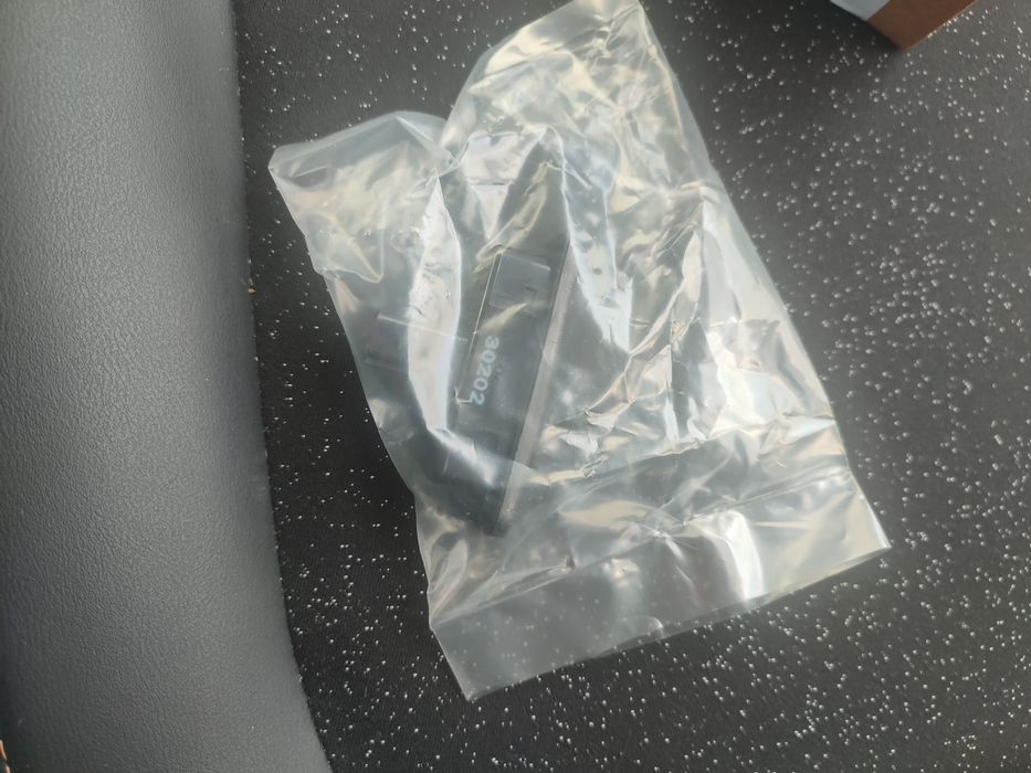 Botão porta bagagens