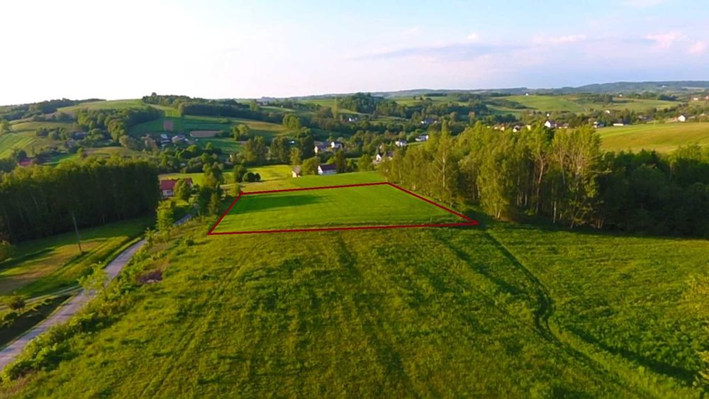 Działka budowlana z WZ przy gminnej drodze asfaltowej -22 a (53 tys) + 27 a (62 tyś)