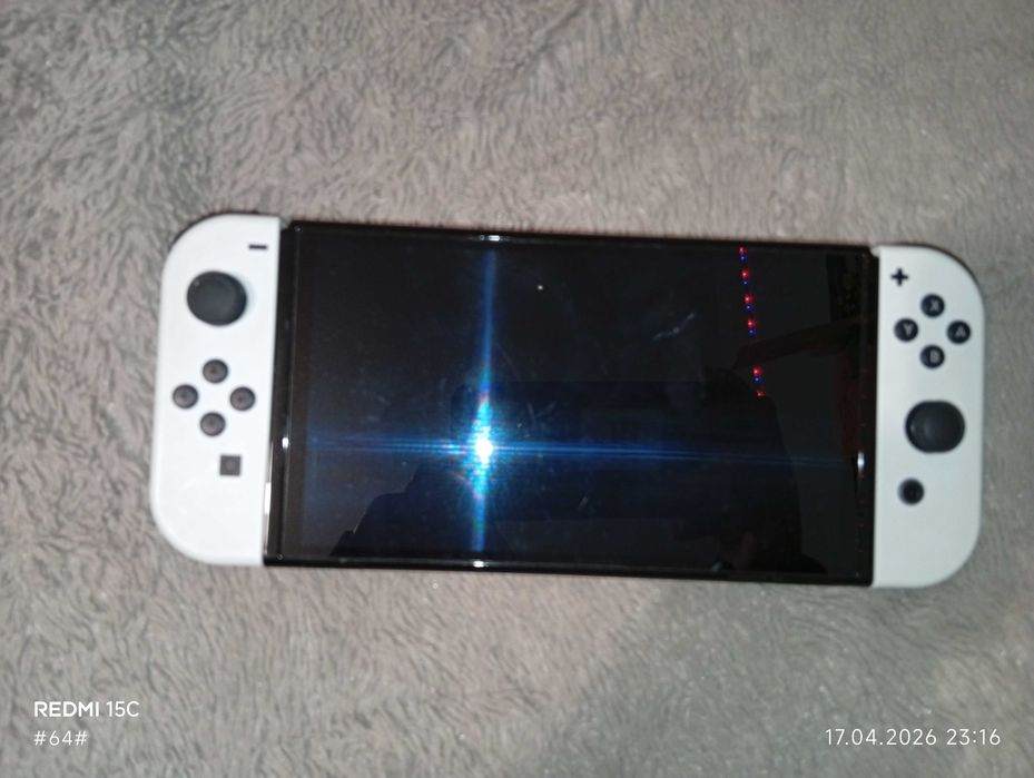 Приставка nintendo switch OLED 64 гігабайти в пам'яті