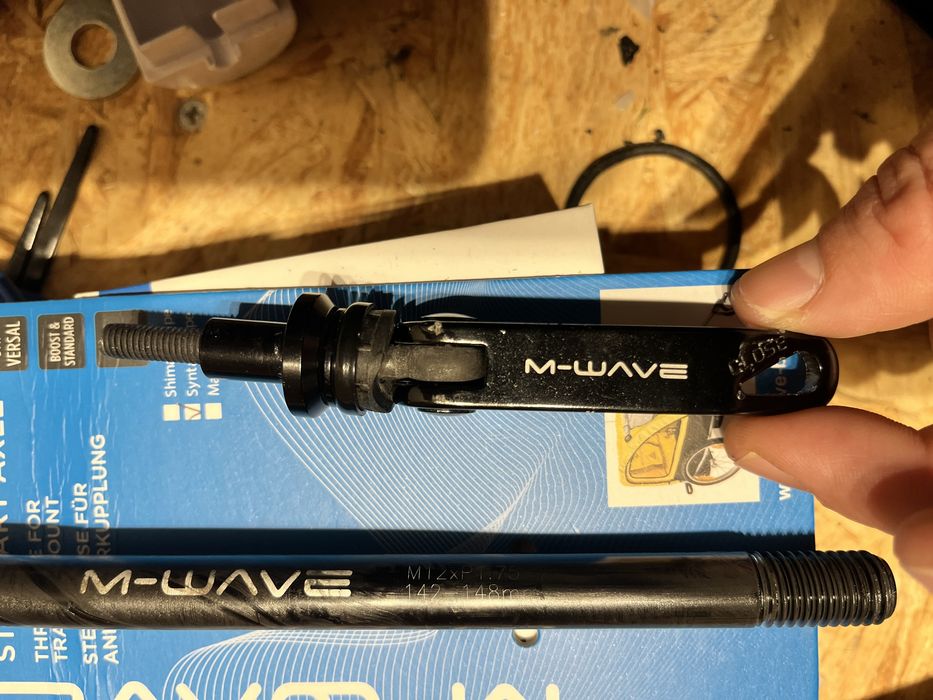 Eixo passante para atrelado de bicicleta