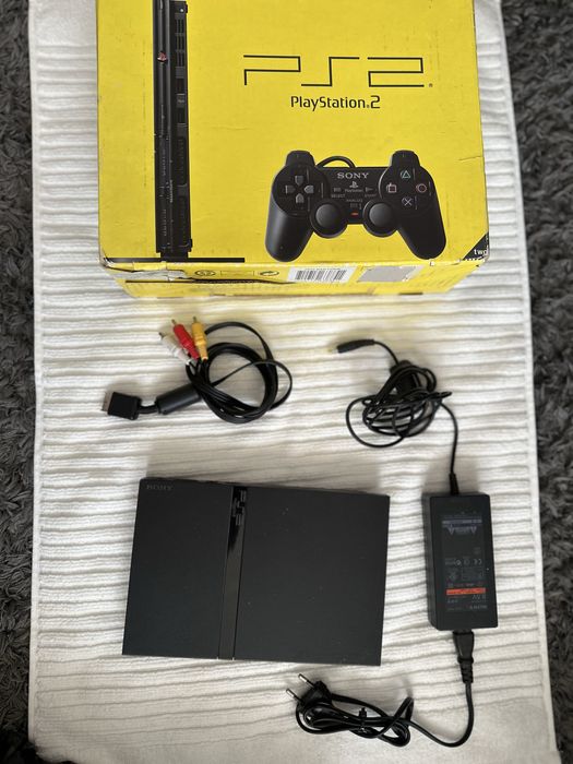 Vendo consola e jogos e comandos playstation 2