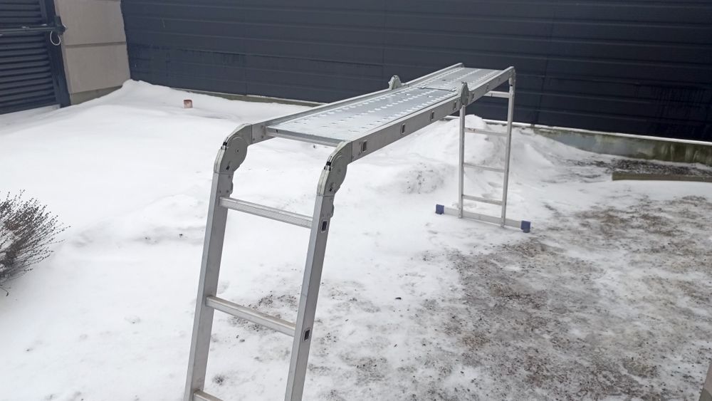 Шарнірна багатофункціональна 4 - секційна драбина (KRAUSE)