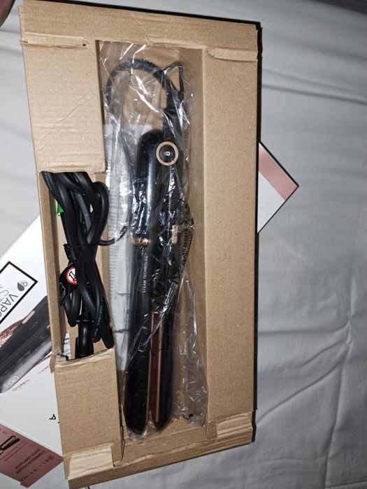 Prancha de alisamento de cabelo a vapor