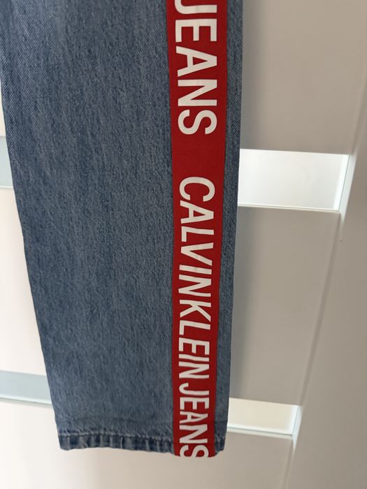 Świetne spodnie Calvin Klein prosta nogawka roz W25xL32