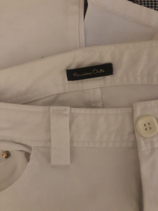Calças brancas Massimo dutti, com fecho no fim de perna