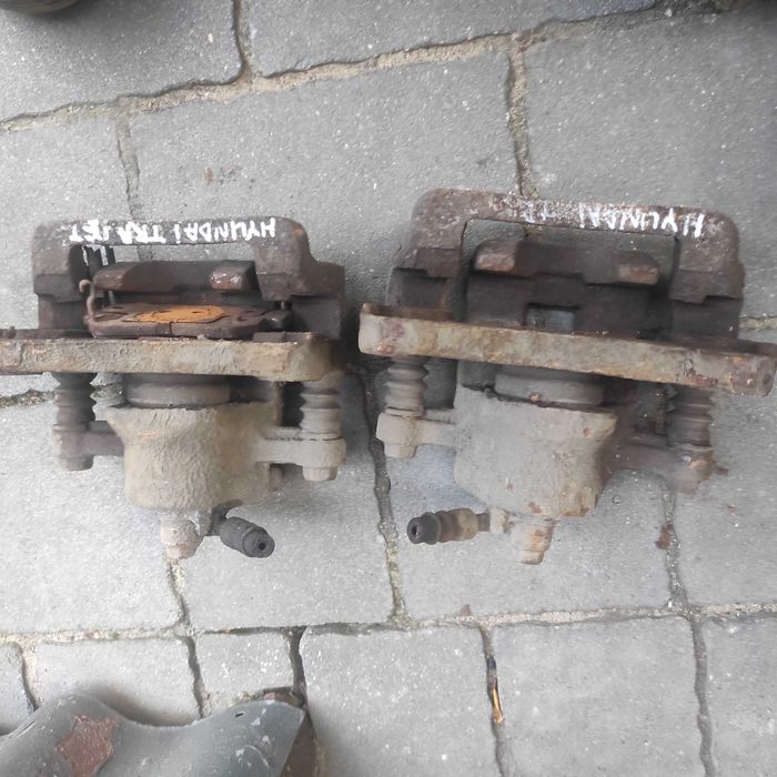 Zacisk zaciski hamulcowe prawy lewy KOMPLET Hyundai Trajet 20, CRDI