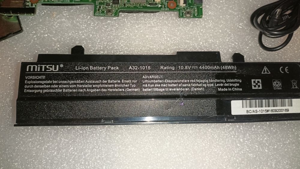 Laptop ASUS - płyta główna, bateria, zasilacz