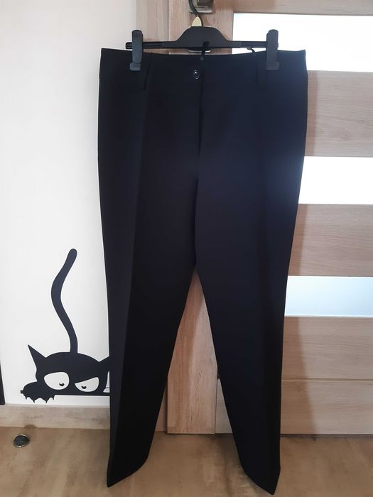 Eleganckie spodnie na kant z szeroką nogawką